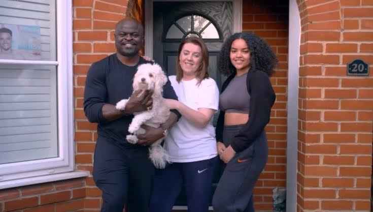 Image - Toby Aromolaran’s parents, Dwaine and Vikki, with his sister, Shauna Aromolaran.