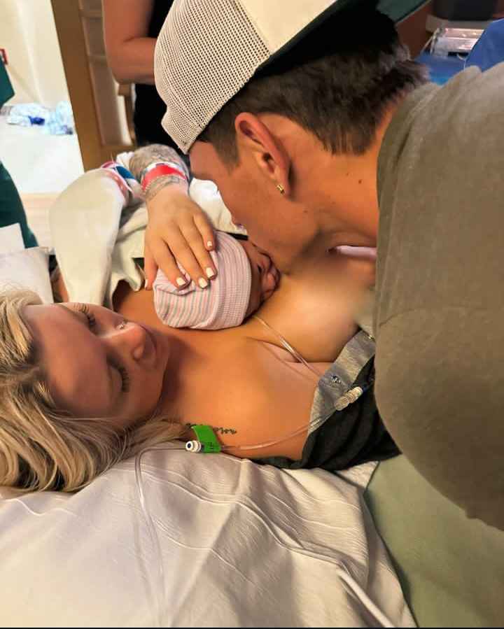 Image - Jacob Savage with his girlfriend, Christen Whitman, on June 25, 2024, marking the day she gave birth to their son, Sutton Daniel Savage. (Source: @iamjacobsavage / Instagram). 