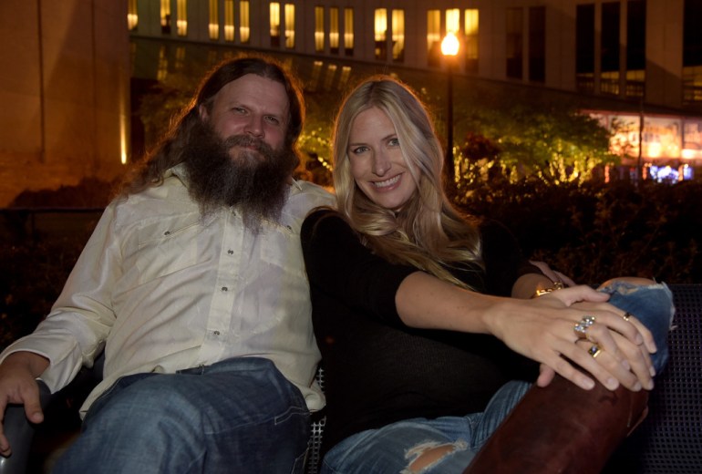 Image - Jamey Johnson pictured with his now ex-wife, Amy Johnson, at a family dinner party. 