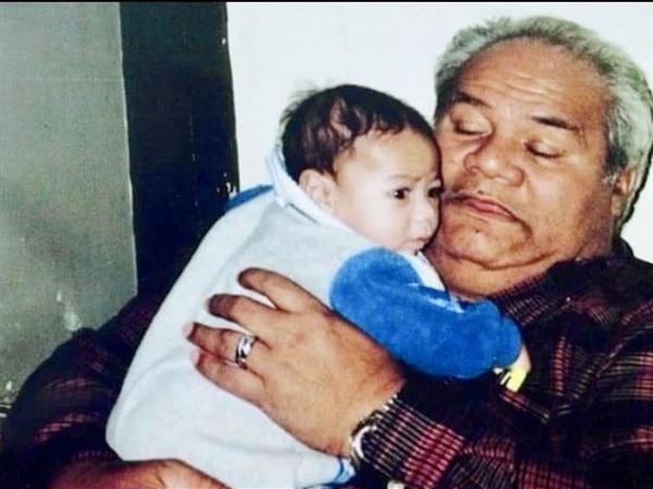 Image - Baby Jaylen Warren held by his late maternal grandfather, Peniamina Solovi. 