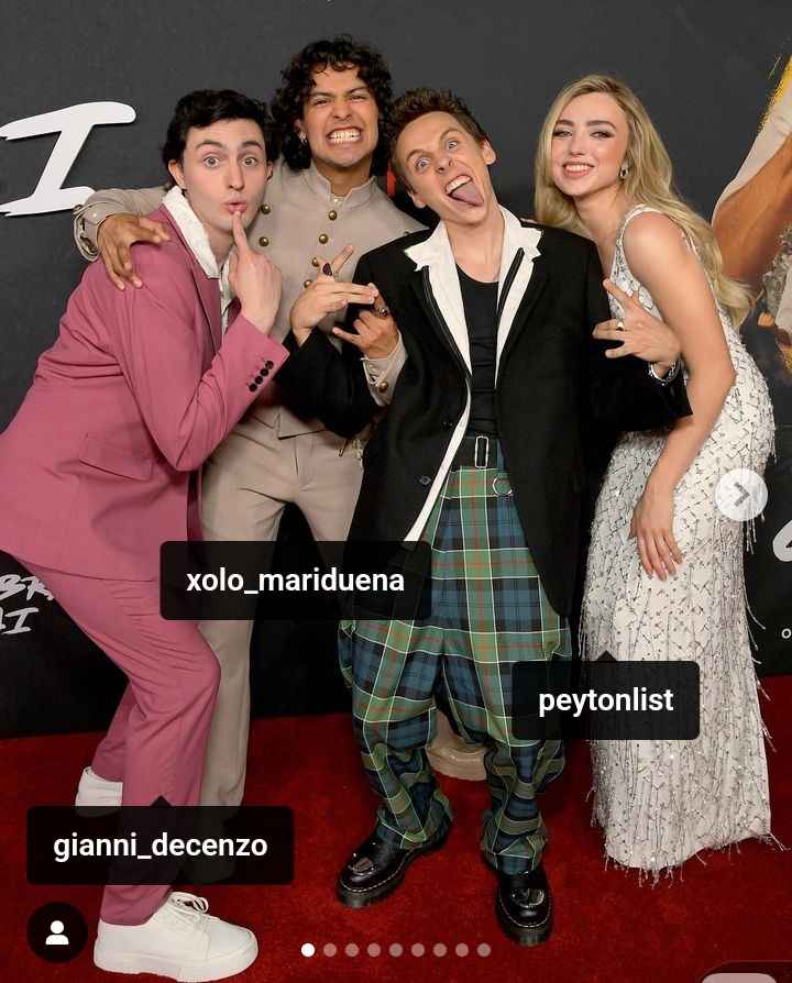 Image - Jacob Bertrand in a behind-the-sce­nes photo with his Cobra Kai co-stars, including his girlfriend, Peyton List, and best friend, Xolo Maridueña. 