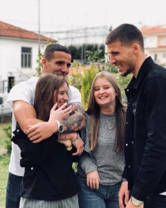 Image - Ruben Dias in a family picture with his older brother, Ivan Dias, and two sisters, Beatriz and Carolina.