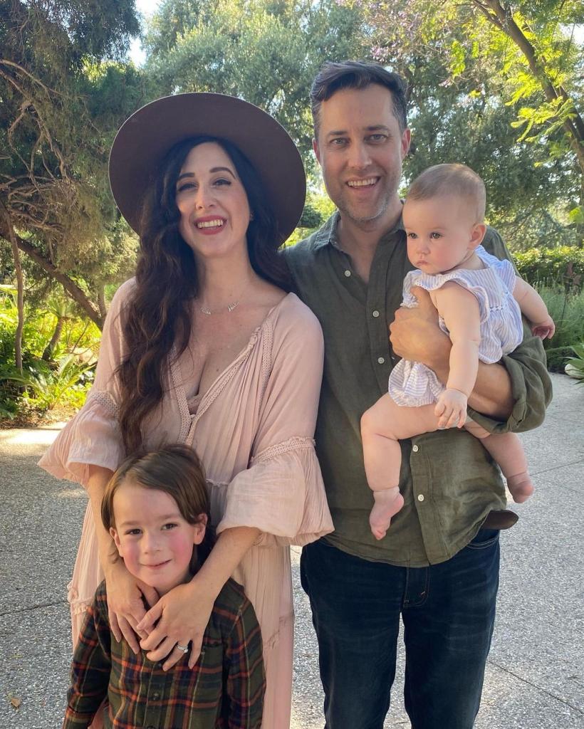 Image - Drew Talbert in a family photo with his wife, Andrea, and two children. 